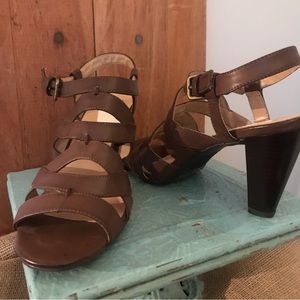 Thick heeled split sandal with ankle back strap.